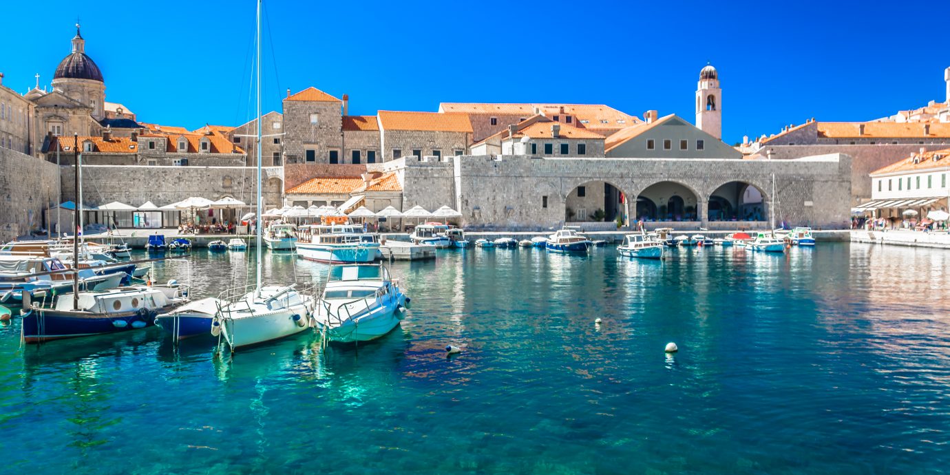 Waterfront view at sea port in Dubrovnik old town, famous european tourist resort in Europe, Southern Croatia.