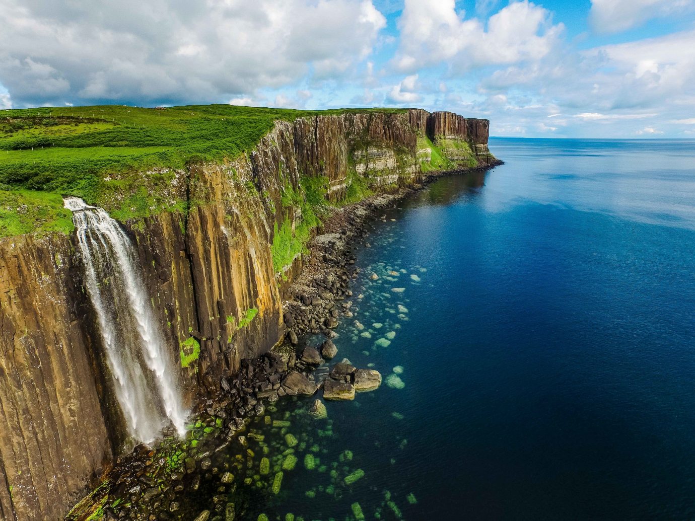 Trip Ideas Nature water outdoor cliff Coast promontory Waterfall headland sky terrain water resources coastal and oceanic landforms River water feature escarpment Sea watercourse klippe bay cove cape formation Lake surrounded