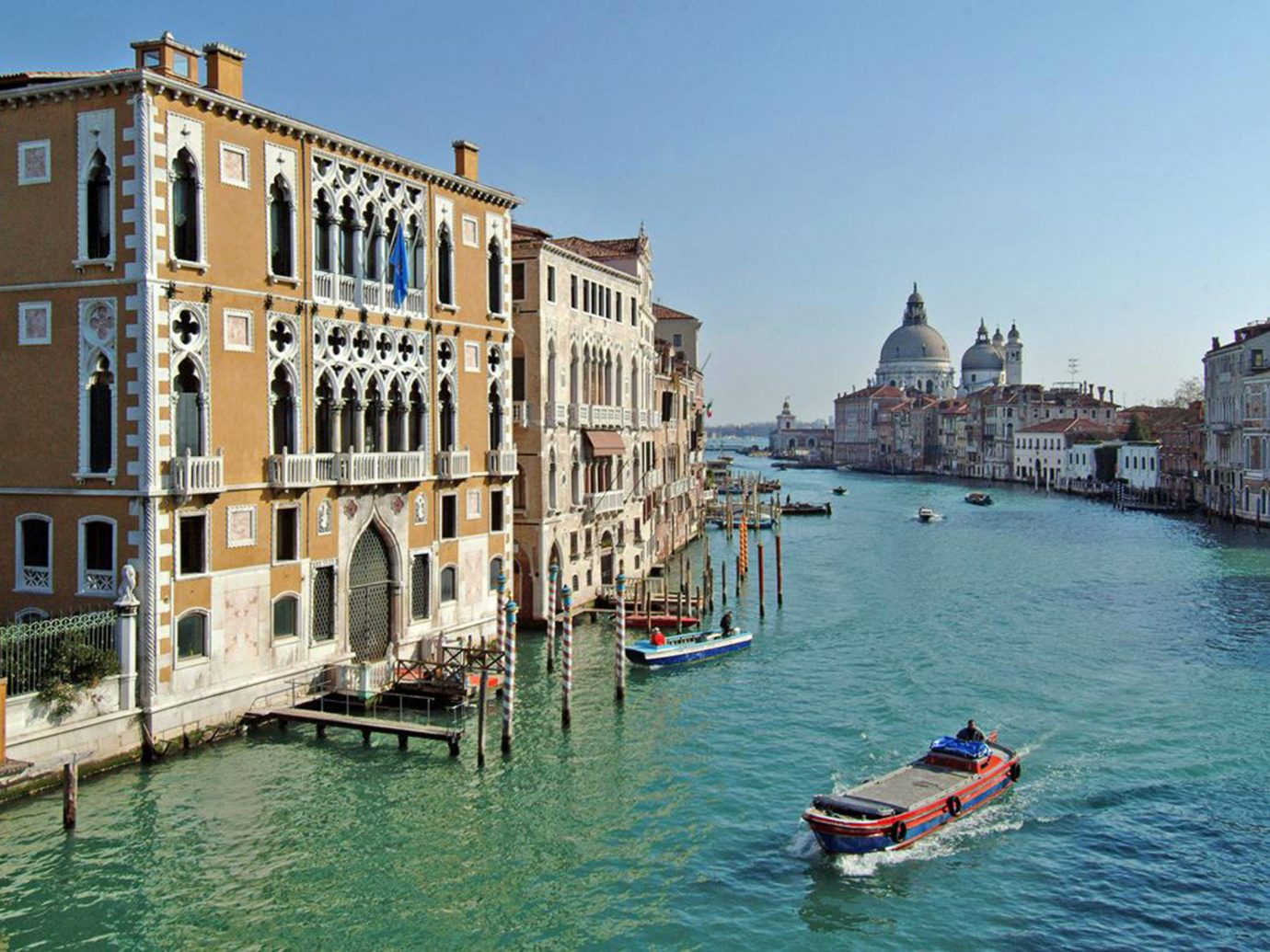 Hotels Italy Luxury Travel Trip Ideas Venice water sky Boat outdoor Canal landform geographical feature body of water Town waterway vehicle vacation River tourism channel gondola Sea cityscape Harbor traveling