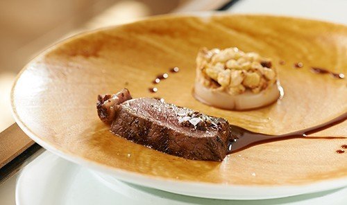 Food + Drink plate table dish food chocolate breakfast meal piece meat cuisine produce dessert slice sliced