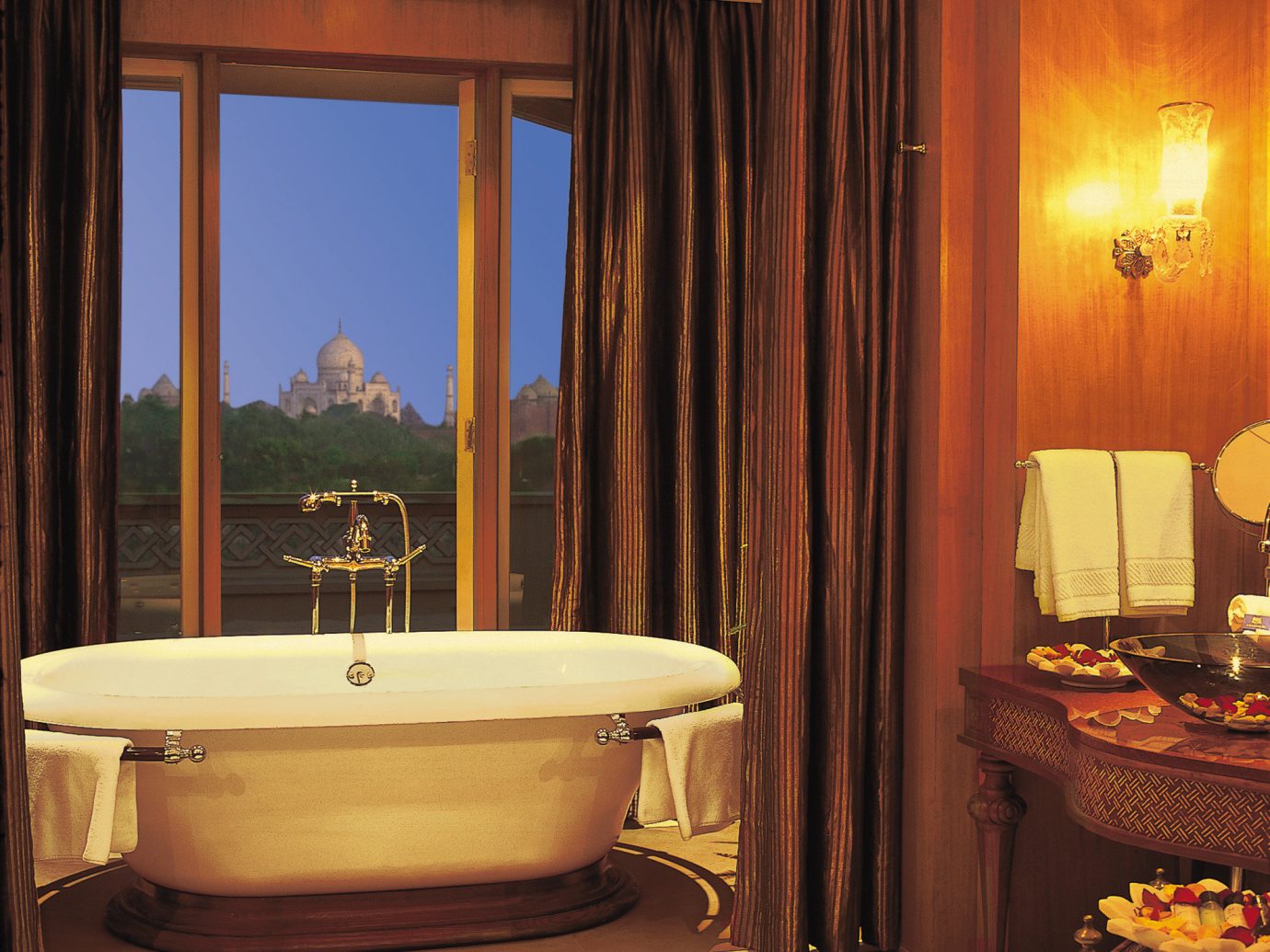 Hotels Luxury Travel indoor room window bathroom Suite interior design estate swimming pool bathtub old tub