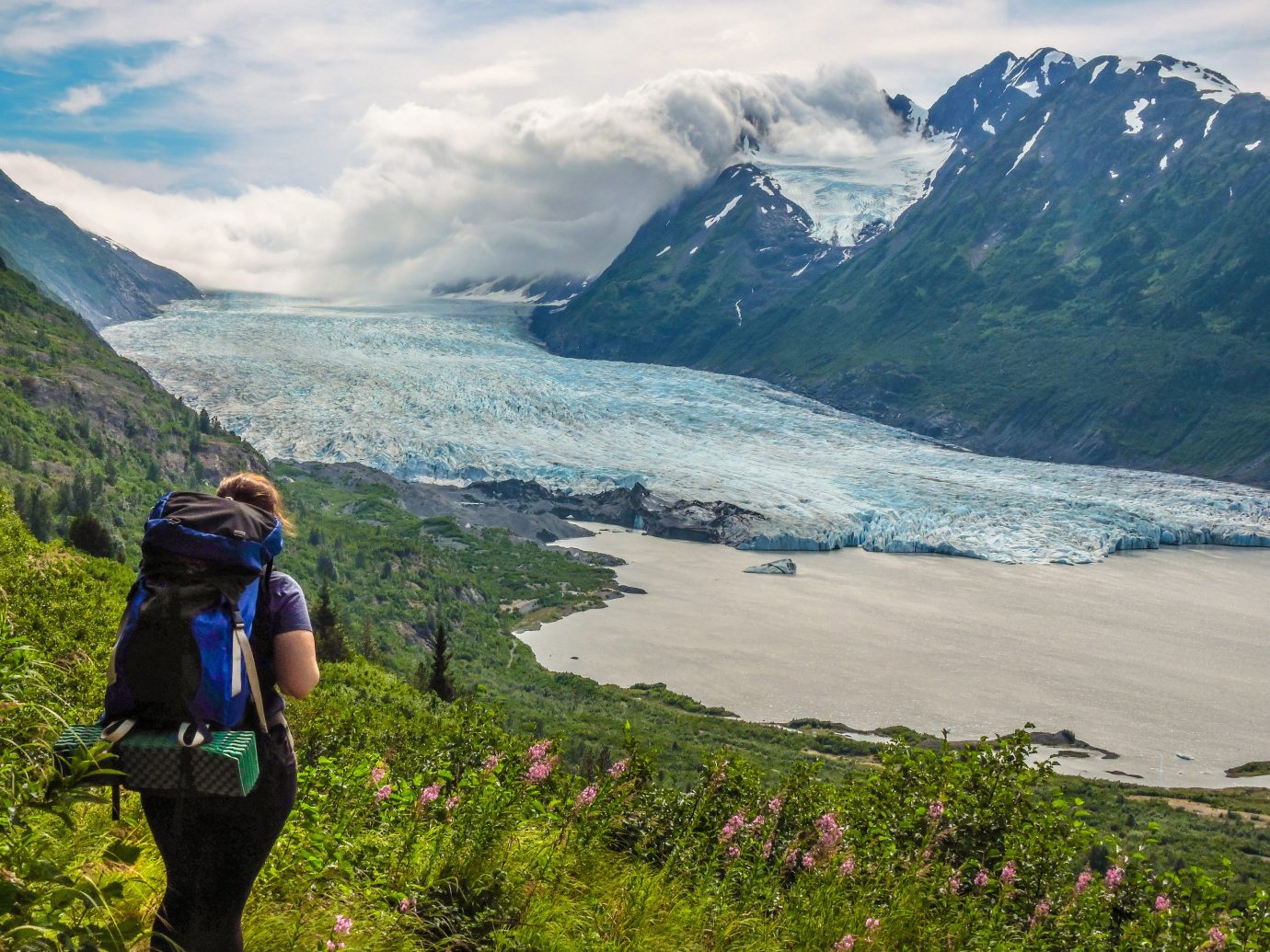 Outdoors + Adventure mountain outdoor sky Nature highland mountainous landforms landform geographical feature mountain range wilderness fjord fell vacation loch walking Adventure alps Lake glacial landform hiking glacier backpacking ridge plateau mountain pass