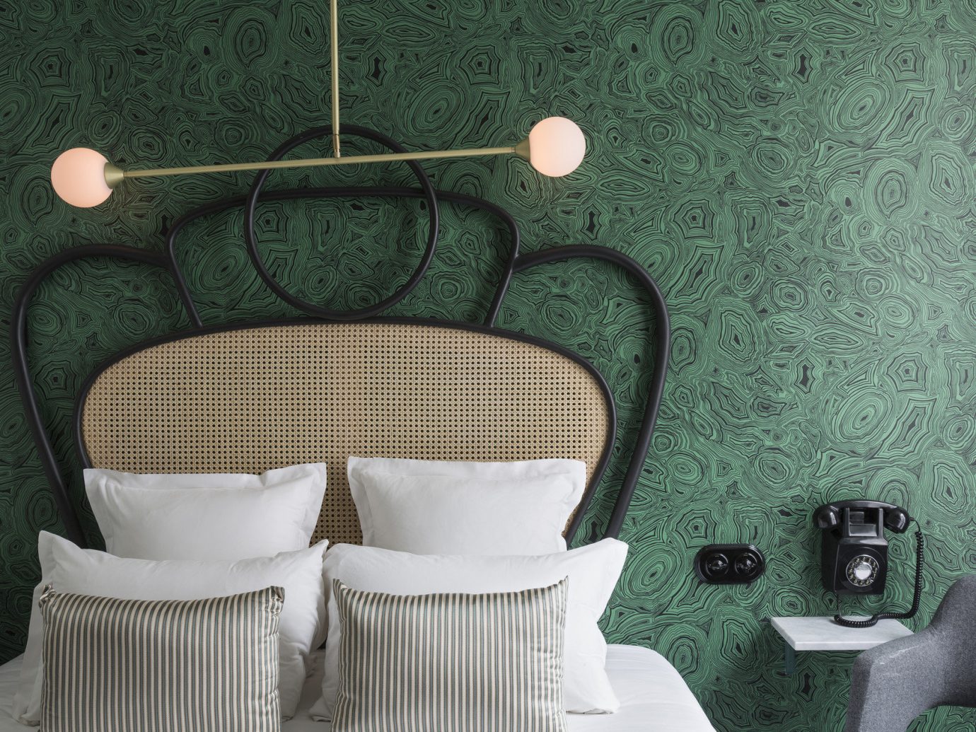 bed Bedroom Hotels interior man made object room green indoor light wall lighting chair Design interior design furniture
