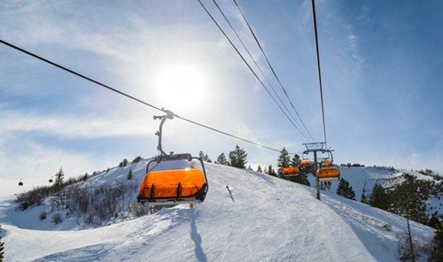 Outdoors + Adventure sky snow outdoor piste ski tow geological phenomenon winter sport Ski skiing ski equipment cable car sports alpine skiing hill day