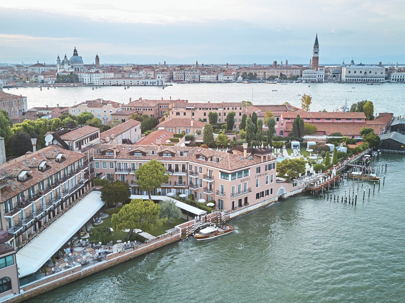 Hotels Italy Luxury Travel Venice waterway City water transportation water River sky channel Canal Harbor Boat port marina cityscape skyline boating watercraft Sea tourism passenger ship bridge