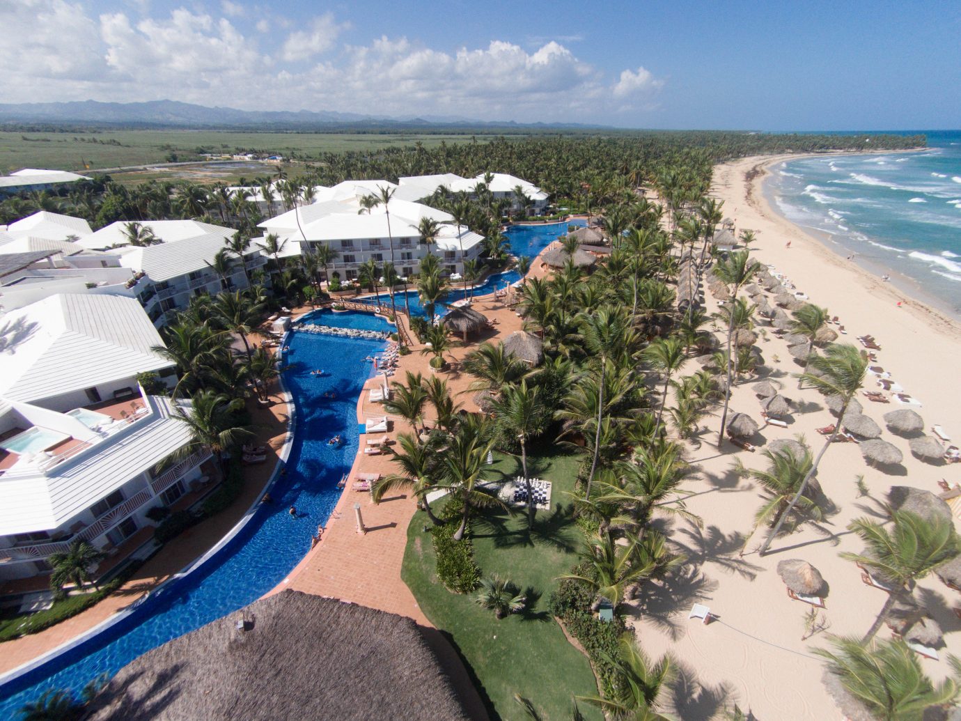 All-Inclusive Resorts Hotels Romance sky outdoor water Nature aerial photography Resort Coast marina bird's eye view Water park vacation Beach shore residential area bay cape Sea dock park reef