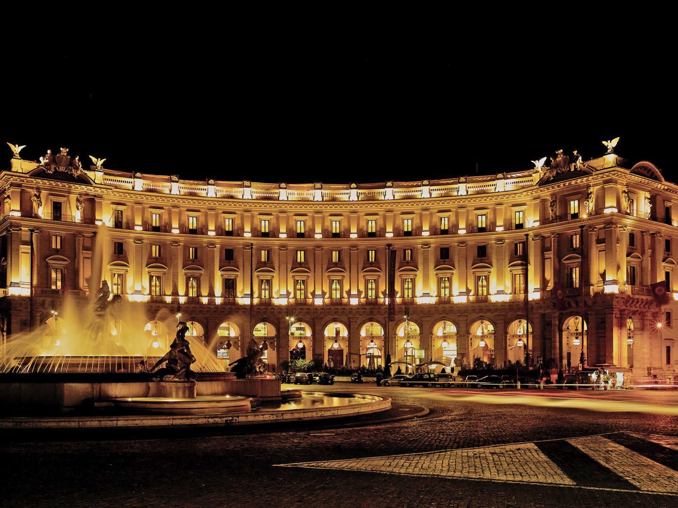 Boutique Hotels City Elegant Grounds Italy Luxury Luxury Travel Romantic Hotels Rome night landmark lit plaza palace metropolis evening opera house light cityscape town square ancient history government building