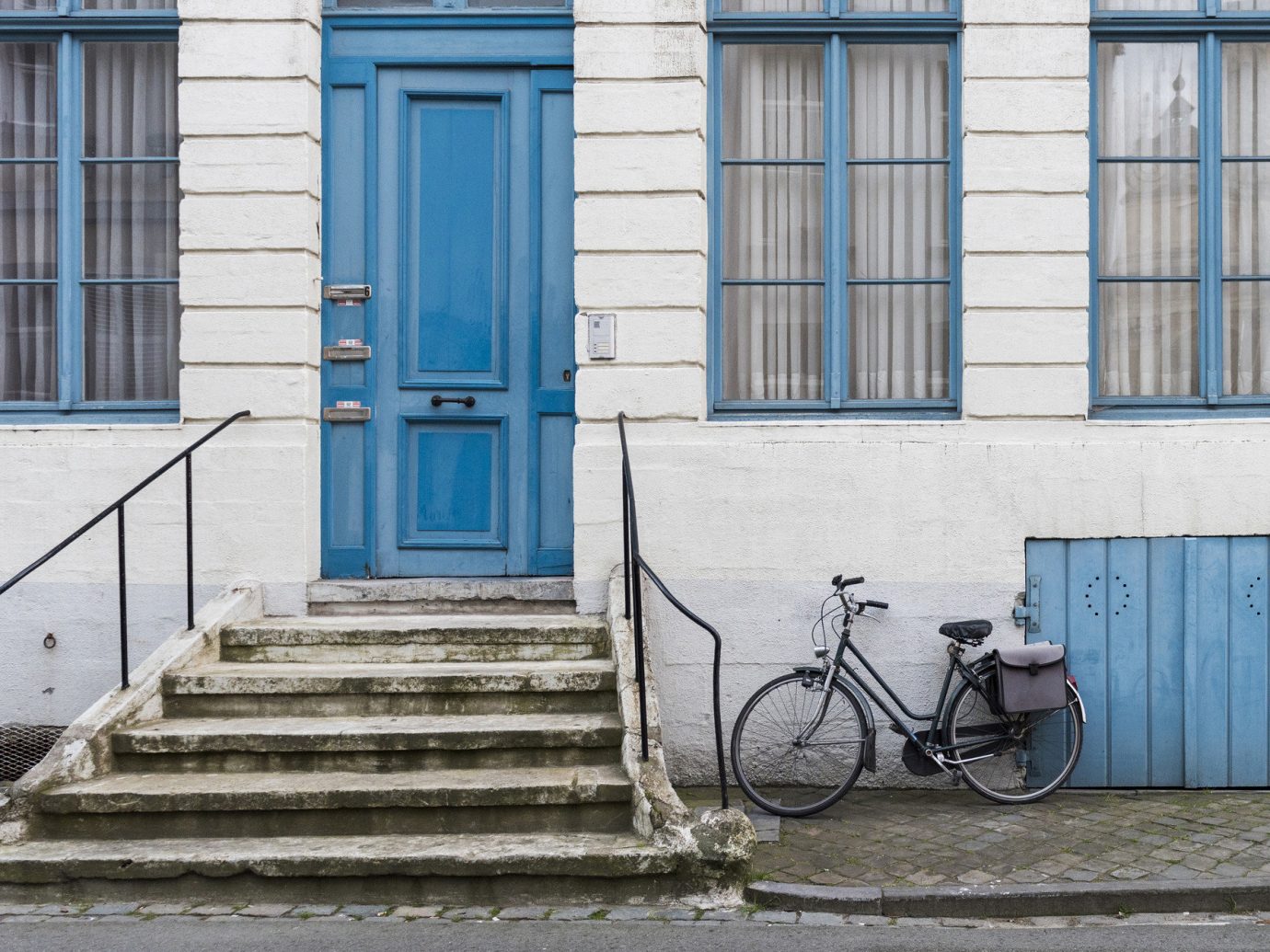 Trip Ideas building outdoor bicycle blue road house urban area wall sidewalk street Architecture home facade window wood infrastructure parked door cottage cement stone concrete