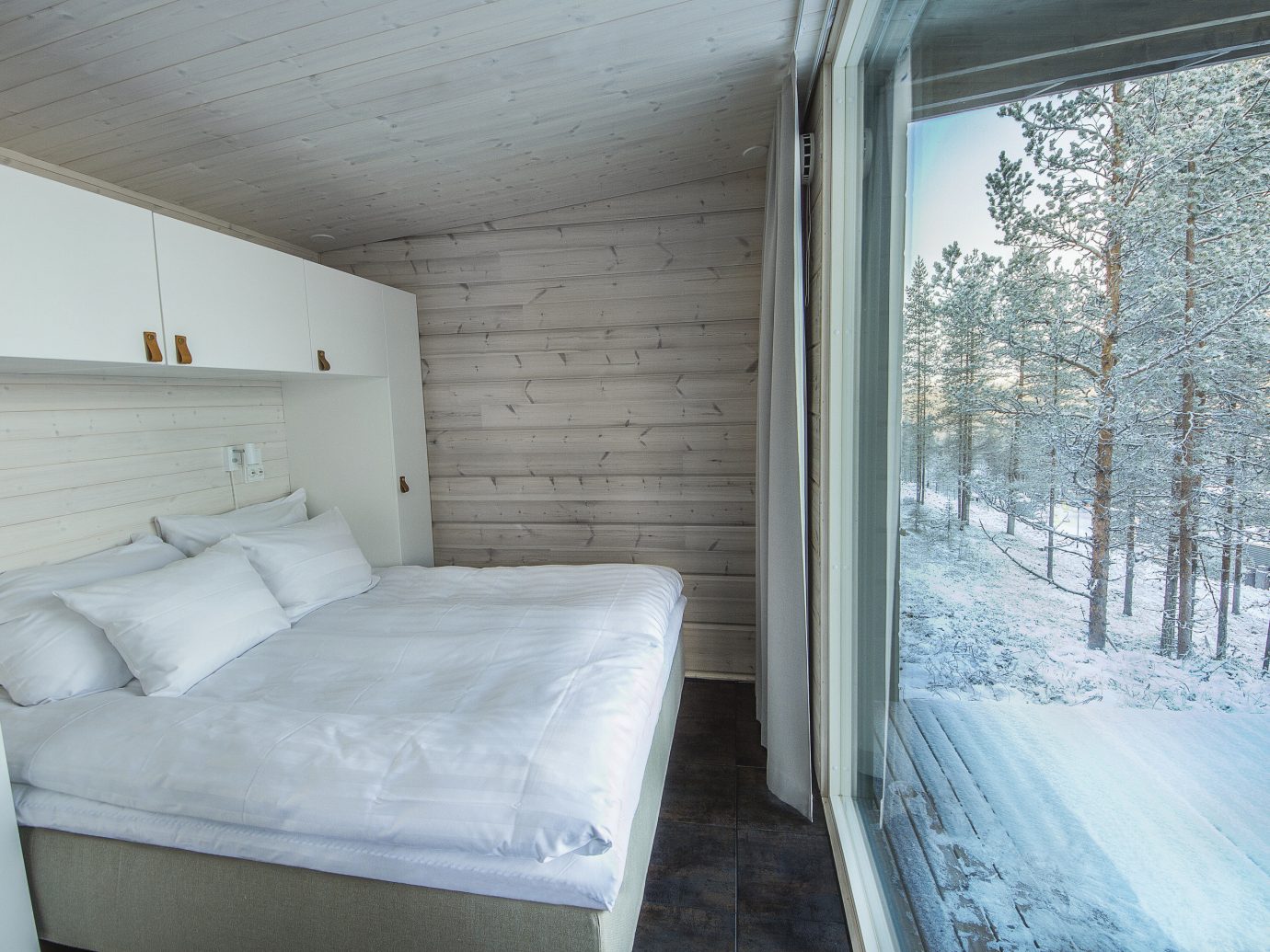 Finland Trip Ideas indoor bed wall room property window Architecture ceiling home house real estate Bedroom snow interior design wood bed frame daylighting floor Winter