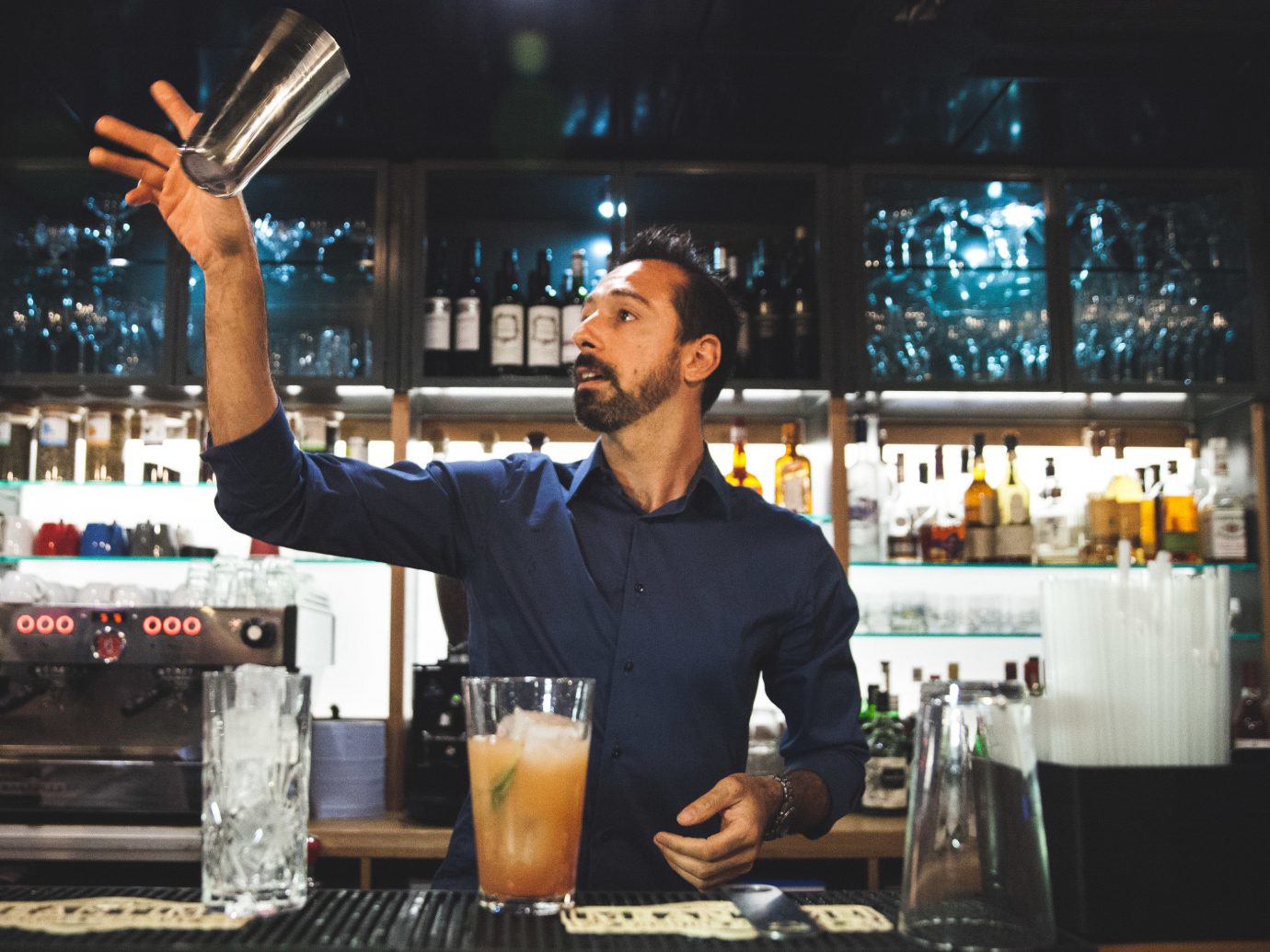 Budget Hotels London person indoor man appliance bartender sense Bar Drink drinking