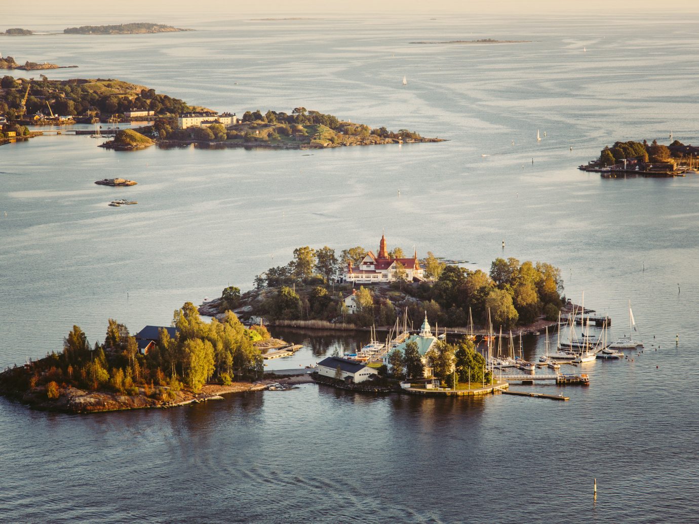 Finland Trip Ideas water outdoor Boat Sea shore Coast Harbor body of water Ocean scene reflection Beach bay vehicle boating Nature wave cove islet watercraft several