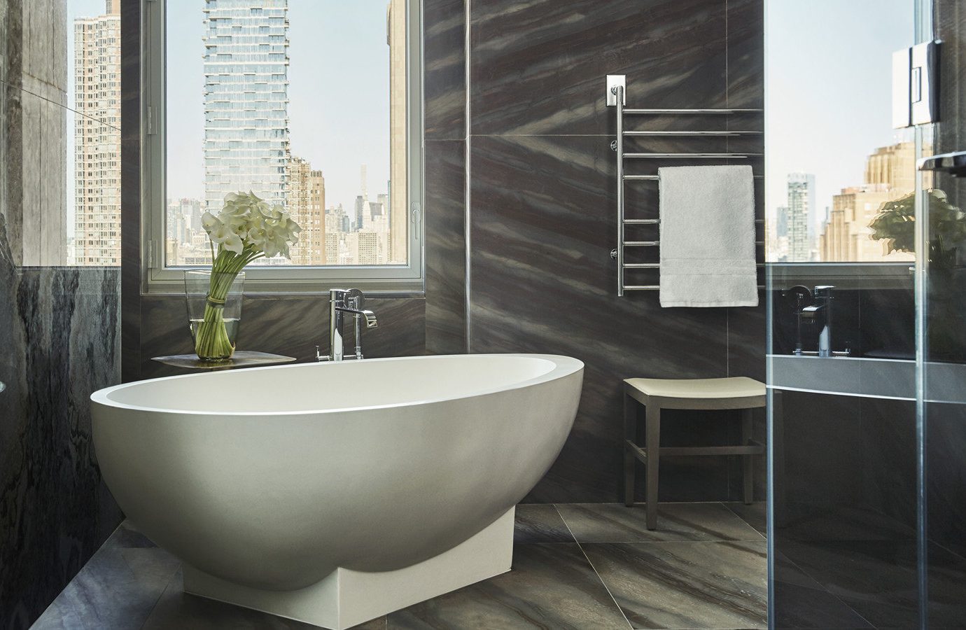 Hotels indoor floor window room bathtub bathroom plumbing fixture bidet interior design flooring tile tub tiled