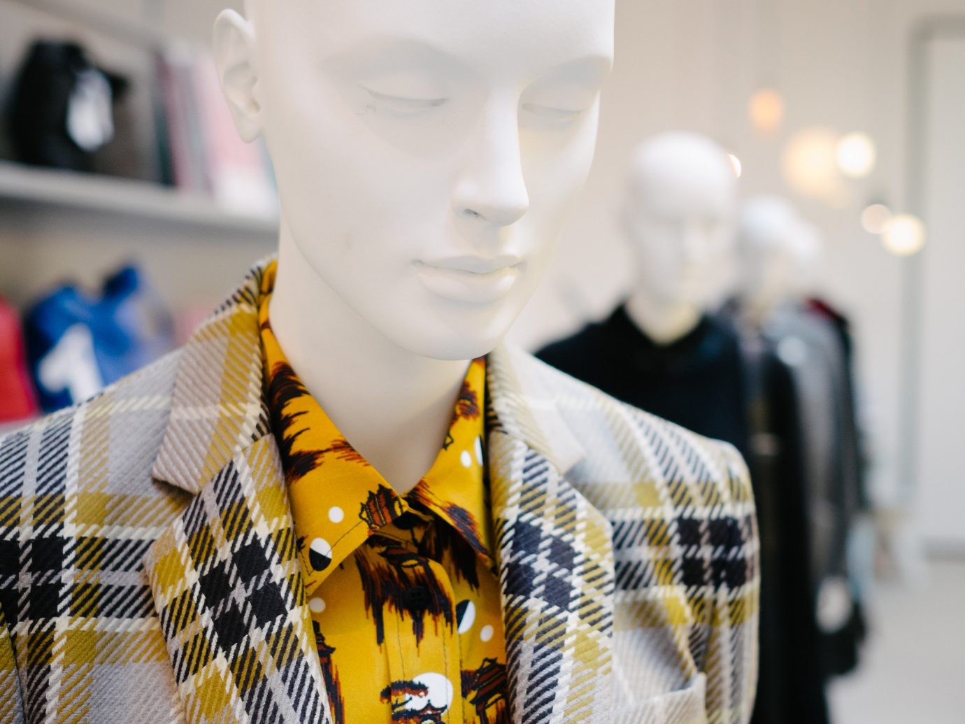 shopping Style + Design Travel Trends Trip Ideas person indoor mannequin yellow wearing Design