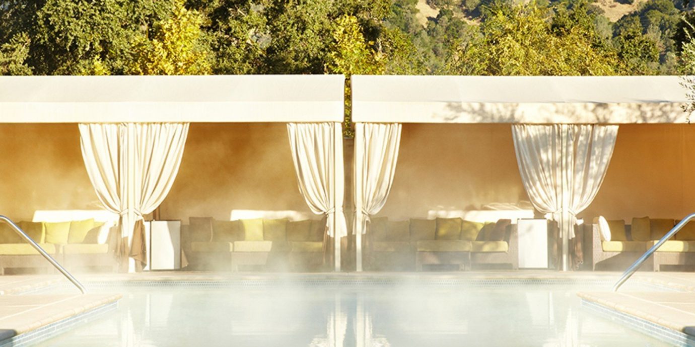 Health + Wellness Hotels Spa Retreats Trip Ideas tree interior design tent Design furniture swimming pool