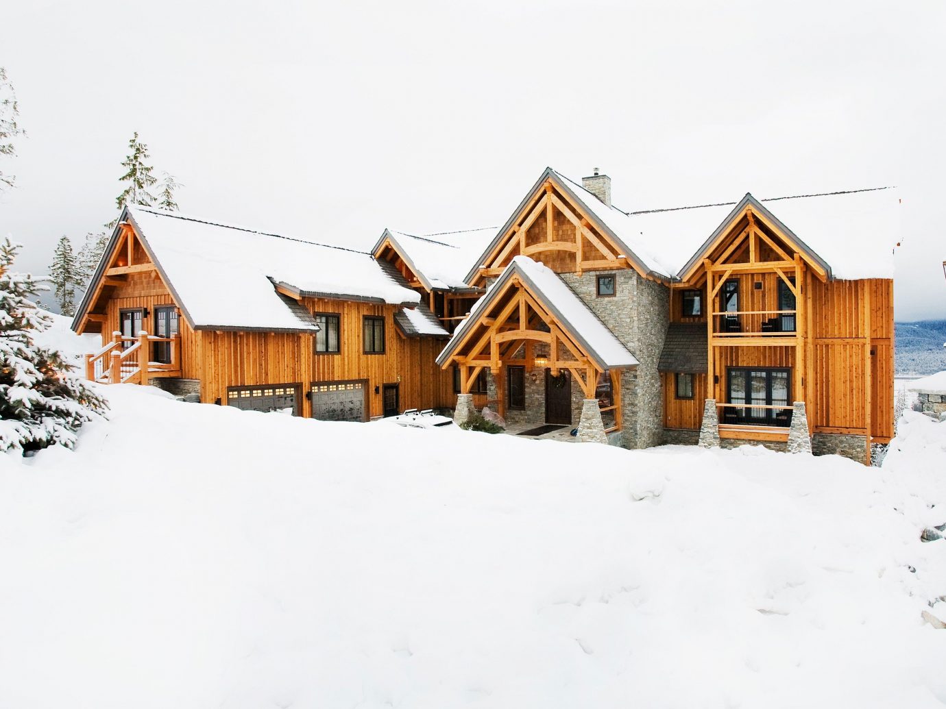 Hotels Luxury Travel Mountains + Skiing Trip Ideas snow outdoor sky Winter weather house building Town season geological phenomenon home residential area neighbourhood blizzard Village sugar house farm building barn