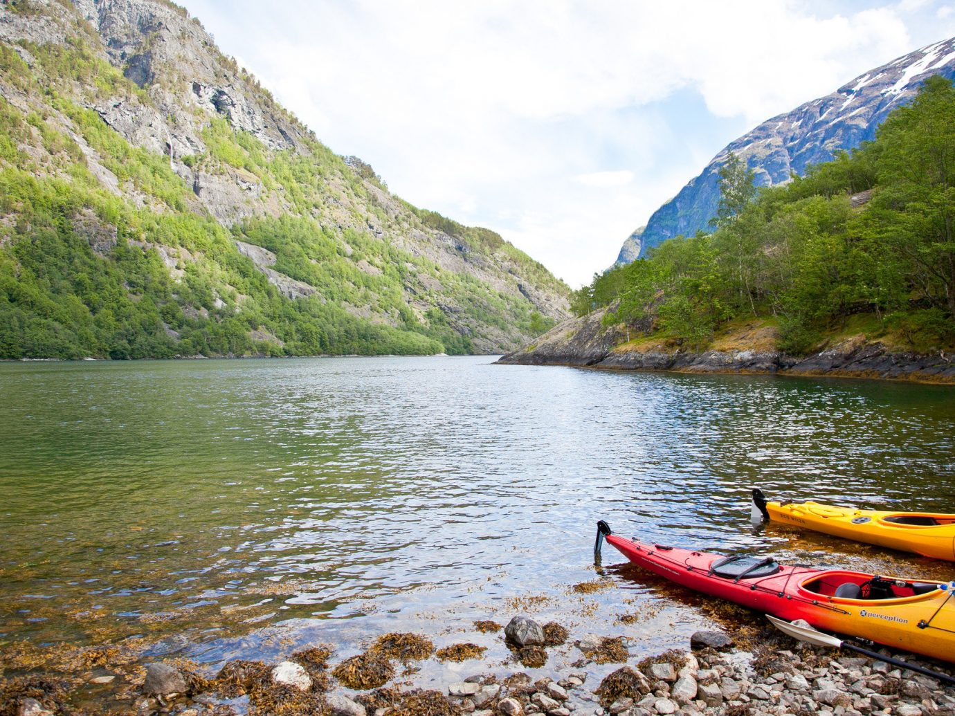 canoeing kayaking Lake Mountains Nature Outdoor Activities Outdoors Scenic views Trip Ideas view viewpoint outdoor water mountain Boat vehicle boating River watercraft transport loch fjord canoe kayak sports equipment