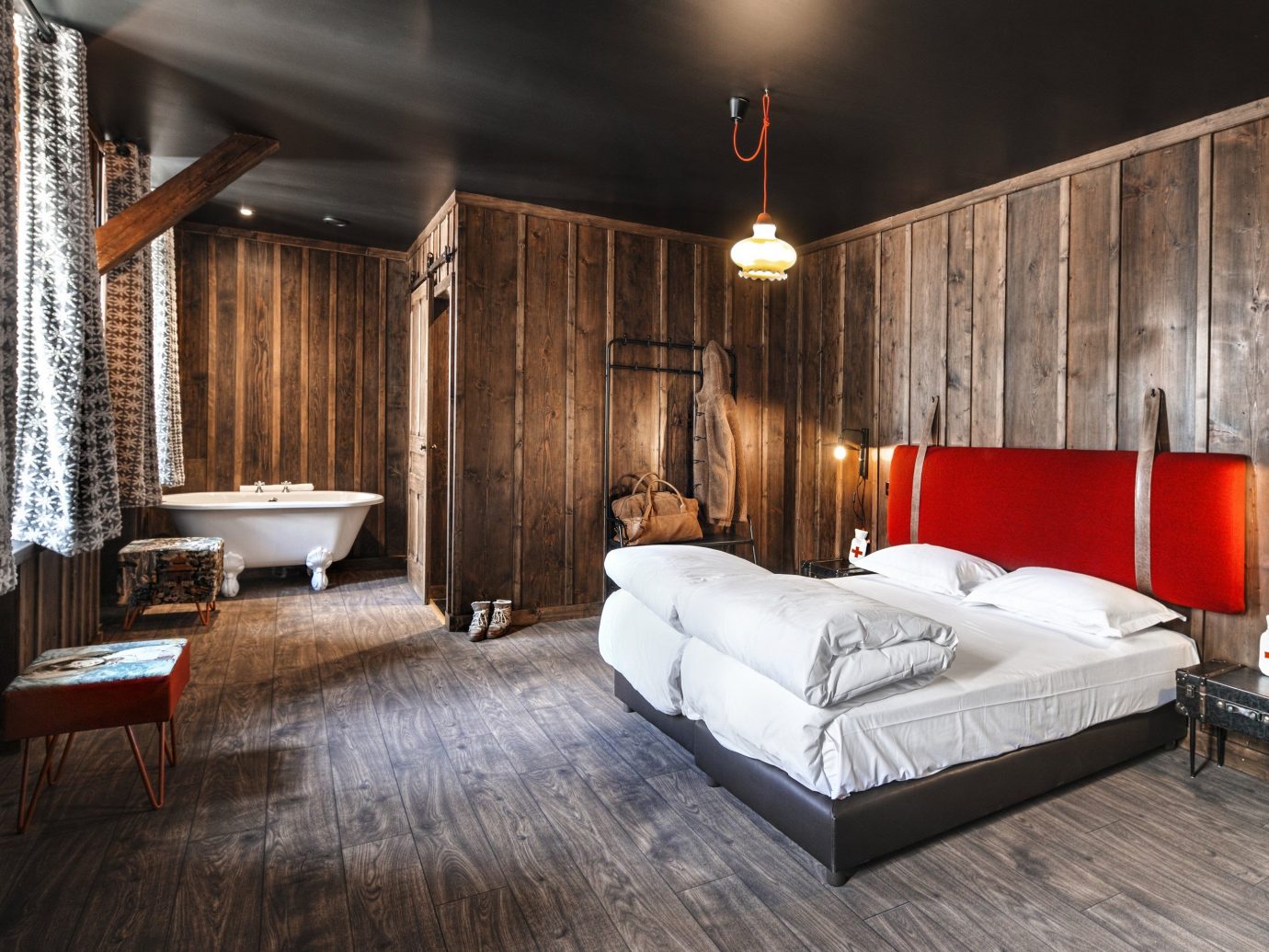 Boutique Hotels Hotels Outdoors + Adventure Winter indoor floor bed room interior design ceiling Architecture wall Suite Bedroom wood bed frame hotel flooring furniture interior designer