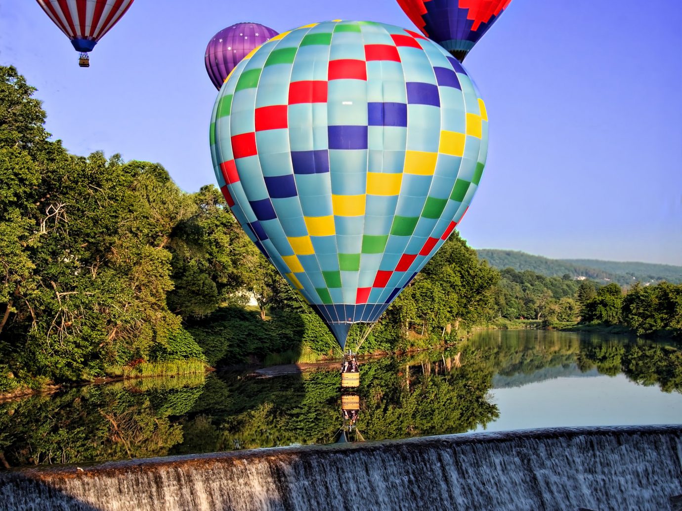 Food + Drink Outdoors + Adventure Trip Ideas Weekend Getaways balloon transport aircraft hot air ballooning Hot Air Balloon Nature outdoor colorful sky atmosphere of earth daytime tourism fun leisure colored