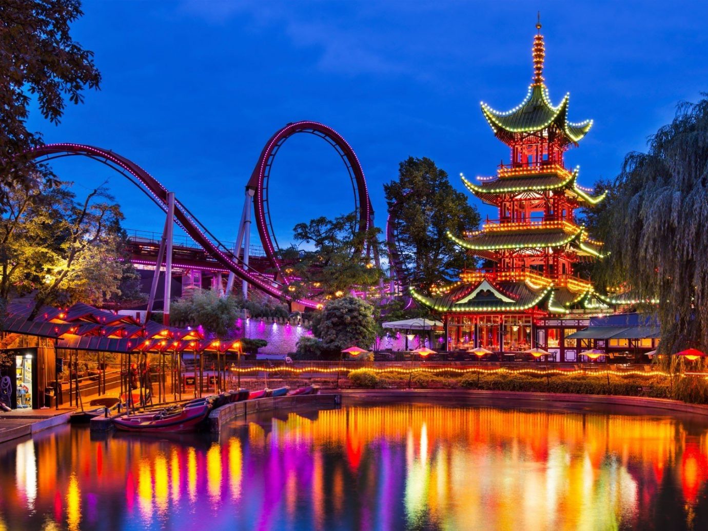 Offbeat tree water outdoor sky landmark River amusement park night reflection park evening cityscape Resort temple colorful