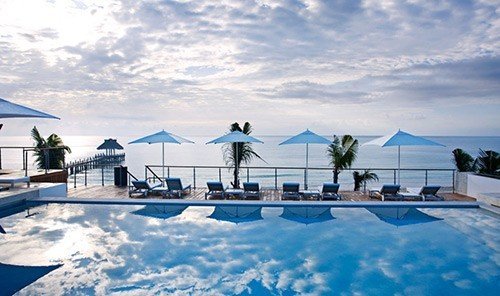 Hotels sky outdoor swimming pool property Resort blue vacation estate Villa cloudy clouds day