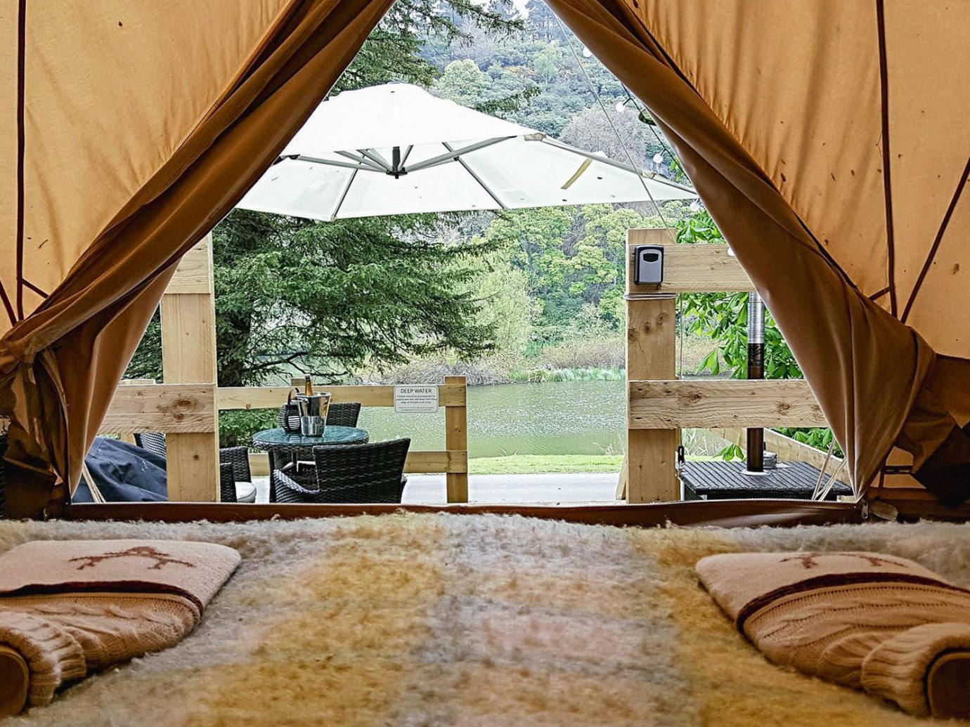Glamping Outdoors + Adventure Trip Ideas property tent room wood home interior design window estate real estate house daylighting