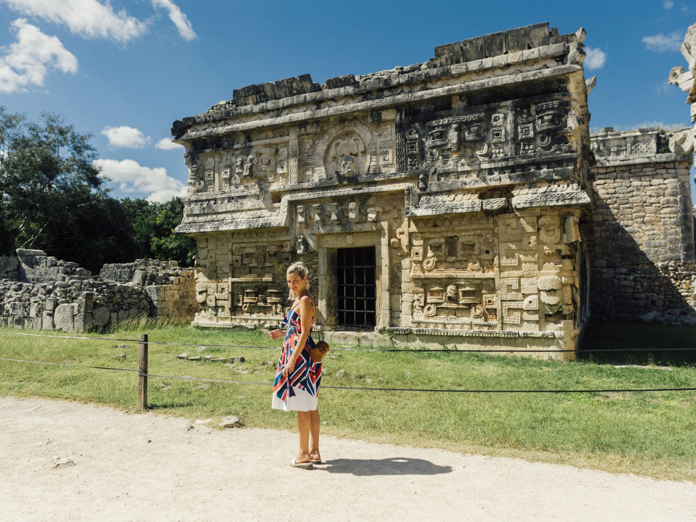 Influencers + Tastemakers Travel Lifestyle Ruins historic site archaeological site ancient history maya civilization sky tourism wall history temple building grass travel maya city vacation monument tree facade