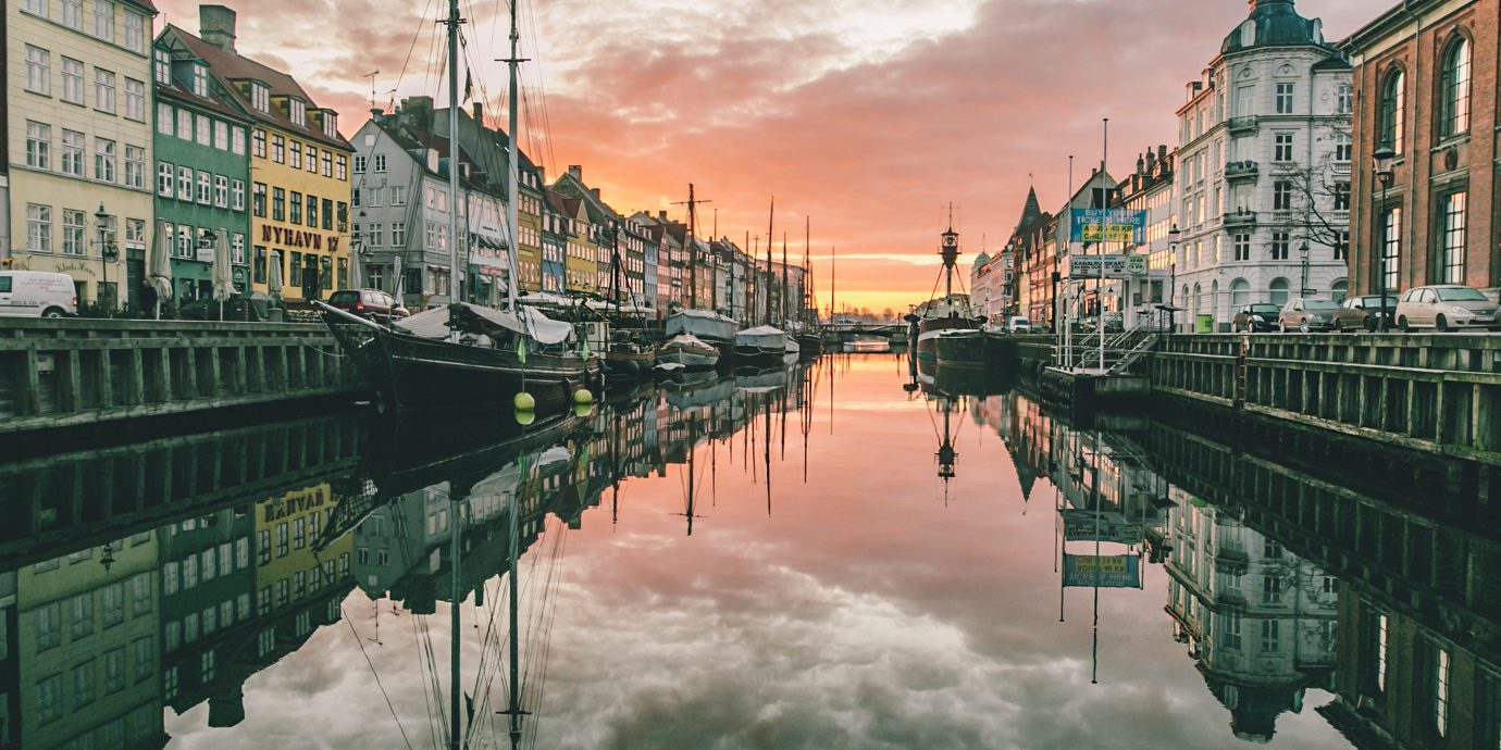 Adventure Copenhagen Denmark Luxury Travel Outdoor Activities Trip Ideas outdoor Canal River reflection landform geographical feature waterway body of water cityscape water scene landmark City urban area Town morning channel evening bridge cloudy line day