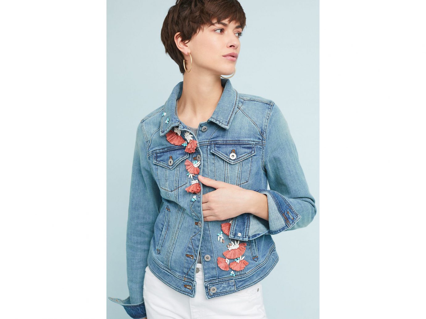Packing Tips Spring Travel Style + Design Travel Shop person clothing denim standing jeans sleeve shoulder outerwear textile fashion model posing shirt button jacket blouse hand