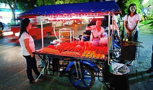 Food + Drink outdoor vendor vehicle cart marketplace food street food stall pulling