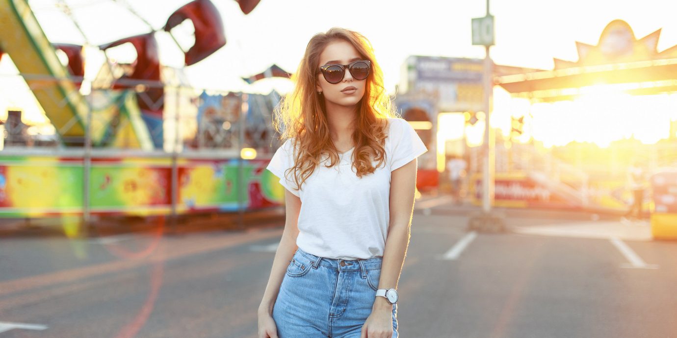 fashion Packing Tips shirt style Style + Design Travel Shop person clothing photograph yellow jeans outdoor girl snapshot fun shoulder vacation sunglasses shorts cool summer happiness vision care smile trousers denim leisure