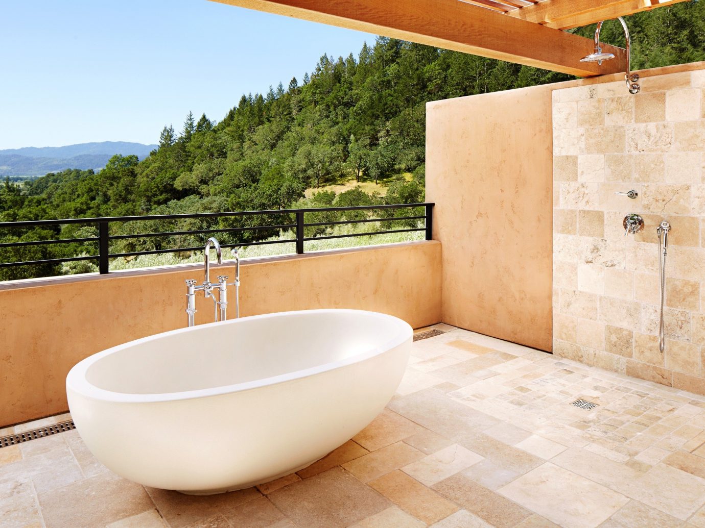 Hotels Offbeat room property swimming pool bathtub plumbing fixture floor bidet bathroom estate flooring sink tub stone