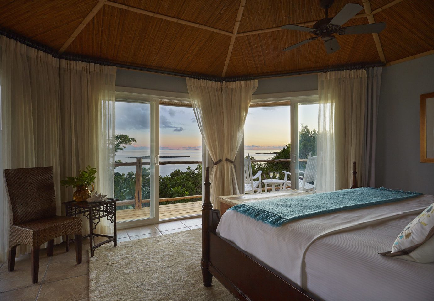Bedroom with beach view at Fowl Cay Resort