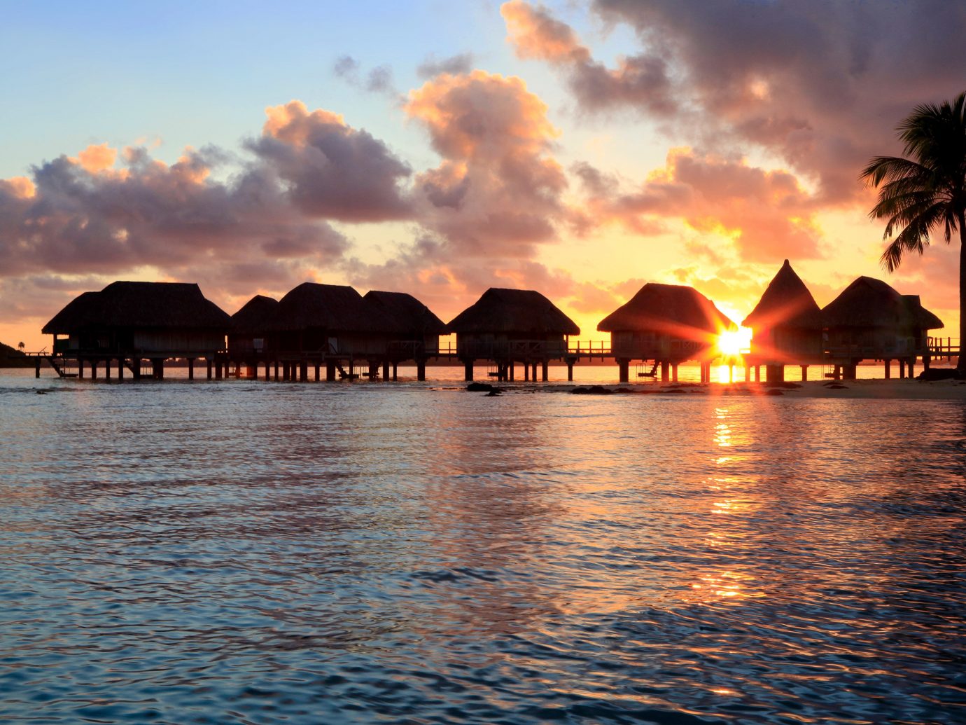 Architecture Buildings Hotels Overwater Bungalow Resort Scenic views Sunset water outdoor sky Sea horizon Ocean dusk Coast sunrise evening Beach bay dawn reflection sunlight cape clouds shore day