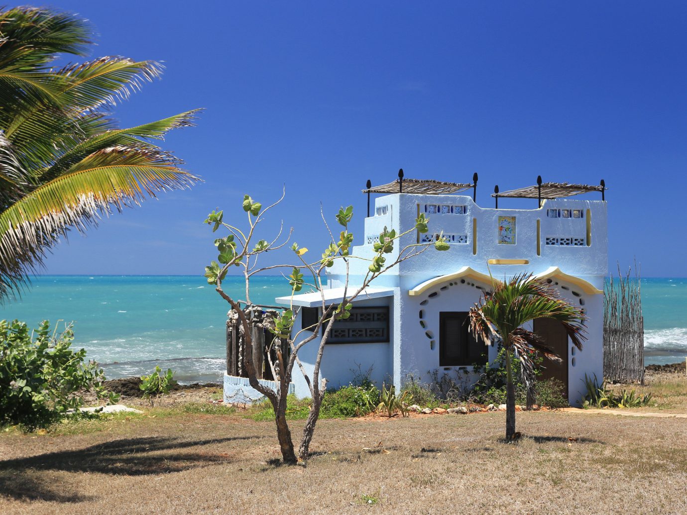 Exterior view of a ocean side cottage in Jamaica