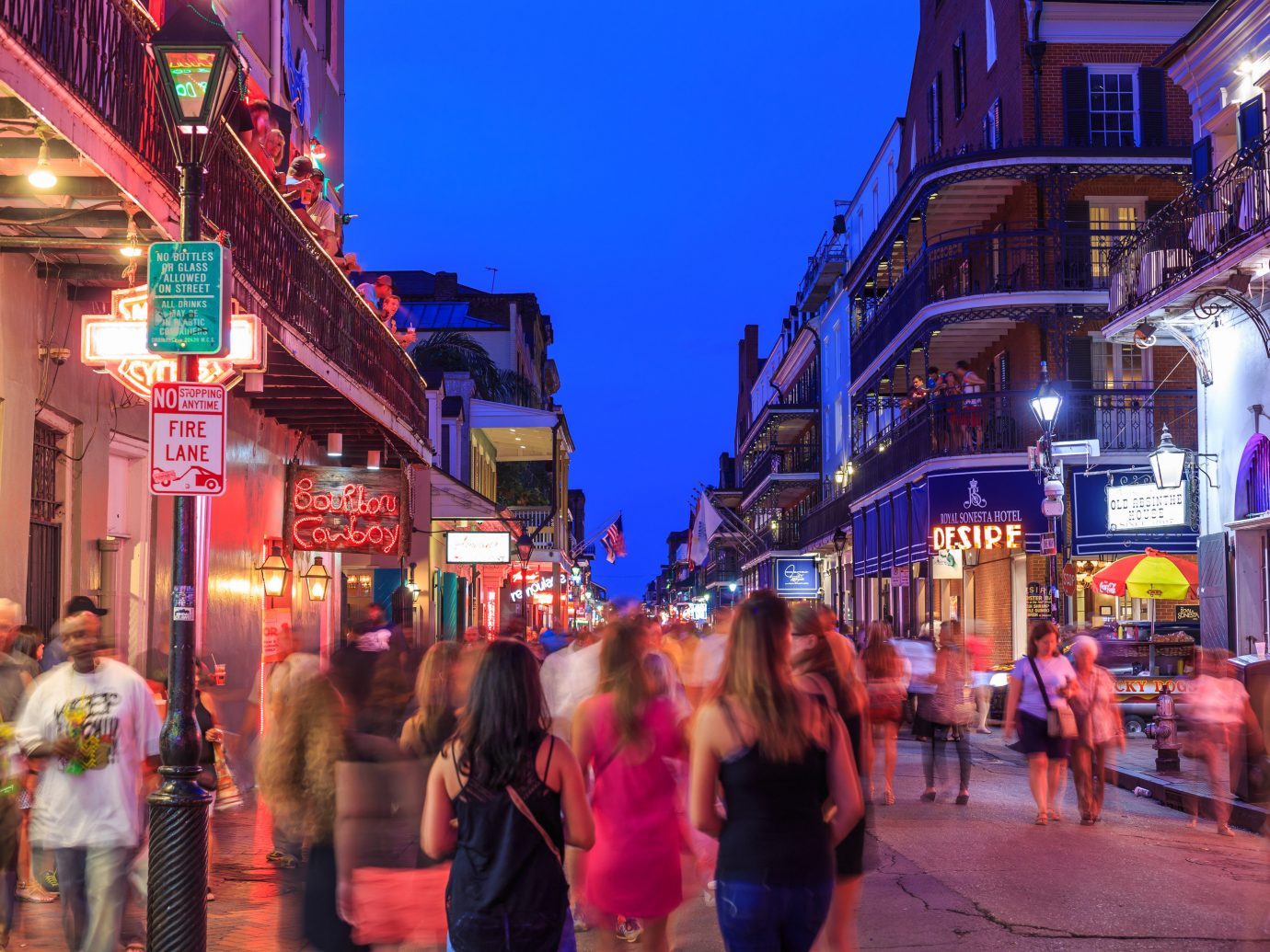 Girls Getaways New Orleans Trip Ideas Weekend Getaways building outdoor street color person crowd road Town City walking human settlement night vacation tourism market Downtown evening infrastructure way travel busy