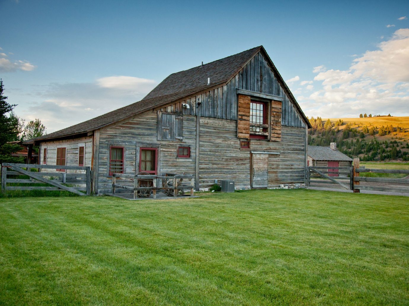 Cabin calm Exterior grass Greenery isolation log cabin Mountains Nature Outdoors remote Rustic serene trees Trip Ideas sky outdoor building house property home estate field residential area lawn barn real estate Farm farmhouse rural area cottage facade grassy siding backyard farm building lush