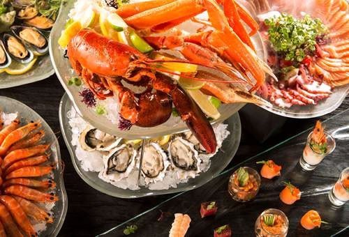 Food + Drink food plate dish Seafood cuisine meal fish buffet hors d oeuvre invertebrate asian food seafood boil animal source foods different meat variety