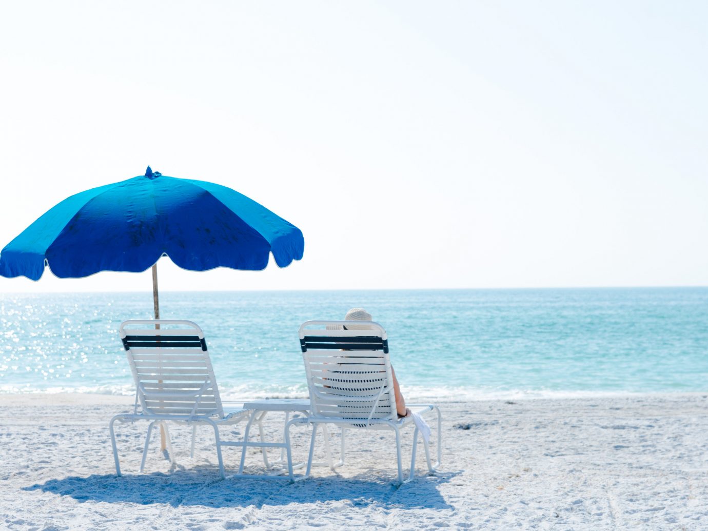 Trip Ideas umbrella outdoor sky chair accessory Nature blue Sea Ocean fashion accessory Beach shore lawn
