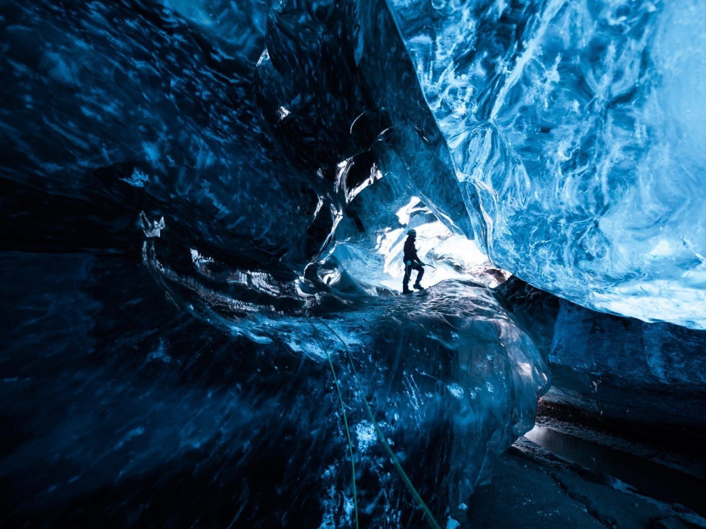Offbeat Trip Ideas ice cave blue landform geographical feature cave ice extreme sport glacial landform screenshot formation sea cave