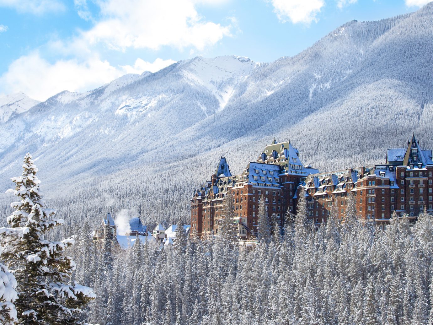 Alberta Architecture Boutique Hotels Buildings Canada Exterior Hotels Mountains Outdoors Resort Scenic views Trip Ideas outdoor mountain sky mountainous landforms snow Winter Nature mountain range wilderness weather season alps frost ridge highland