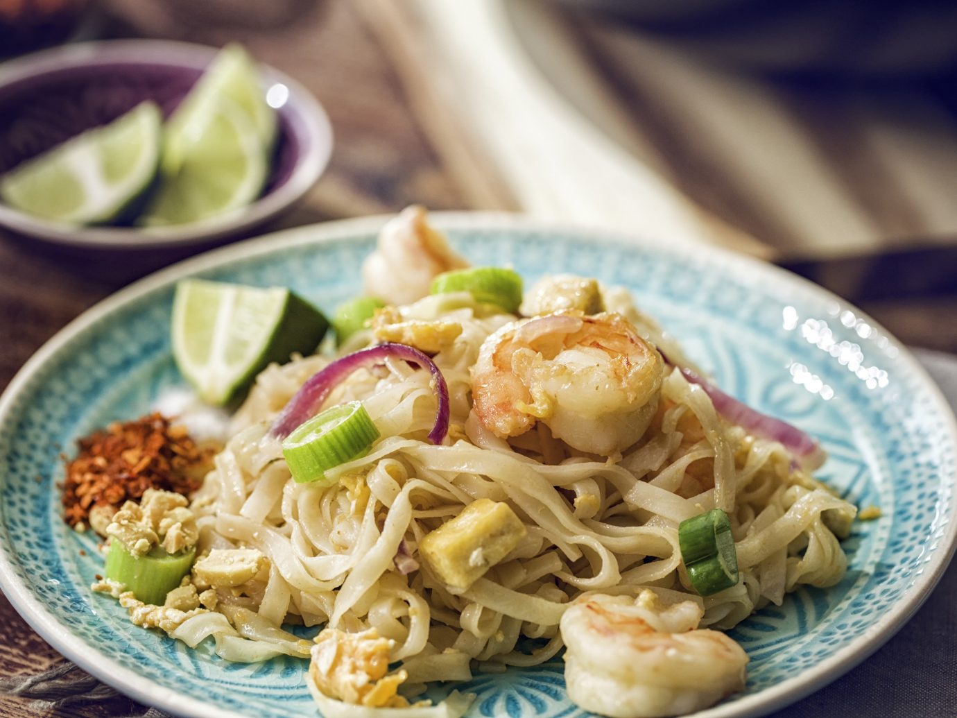 Jetsetter Guides plate food table dish cuisine noodle soup pad thai asian food noodle thai food chinese food chow mein southeast asian food Seafood laksa produce bakmi pasta