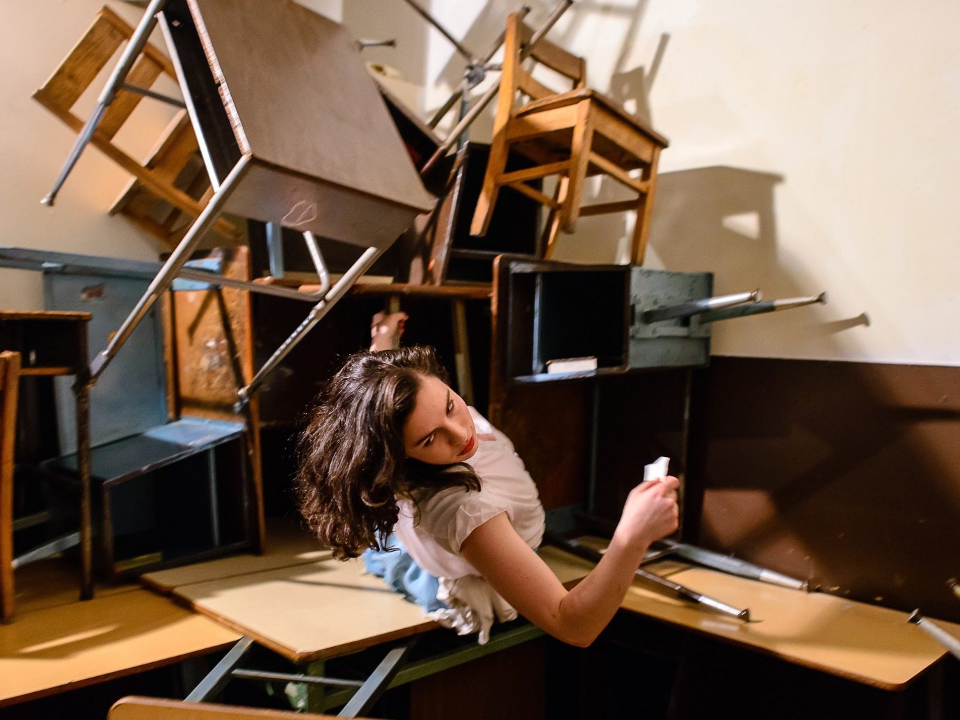 Offbeat person indoor laptop musician pianist worktable