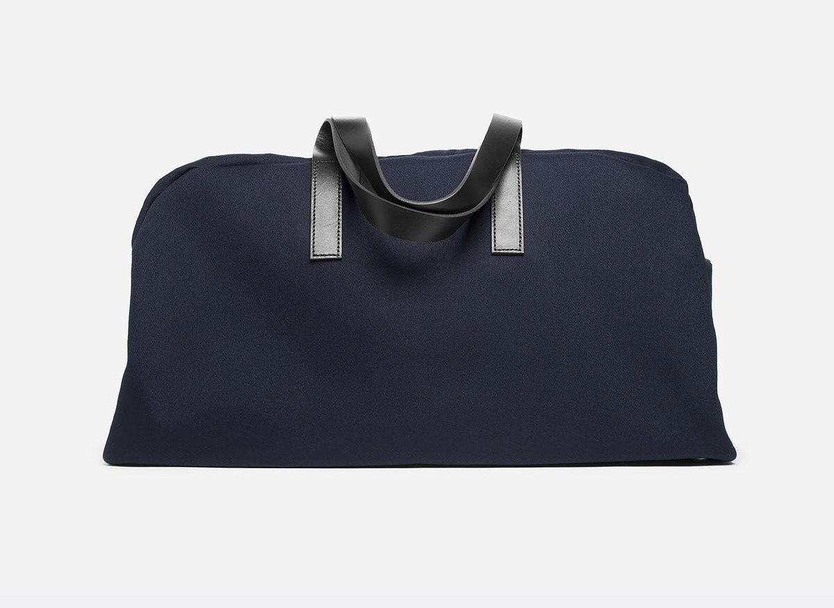 Packing Tips Style + Design Travel Shop bag black handbag product electric blue accessory product design brand shoulder bag