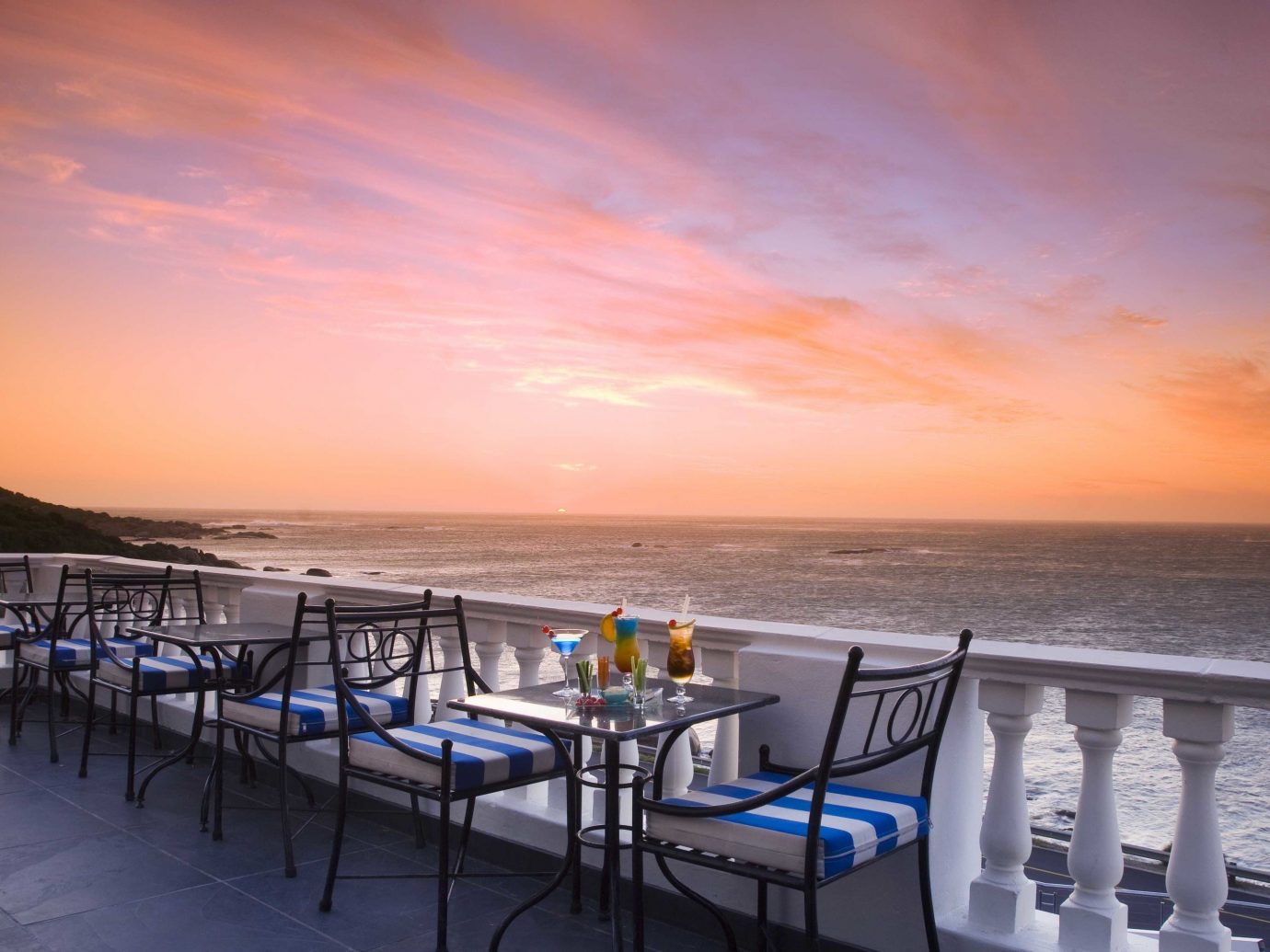 Hotels sky water outdoor Beach Sea Ocean horizon vacation Sunset Coast evening dusk bay shore sandy