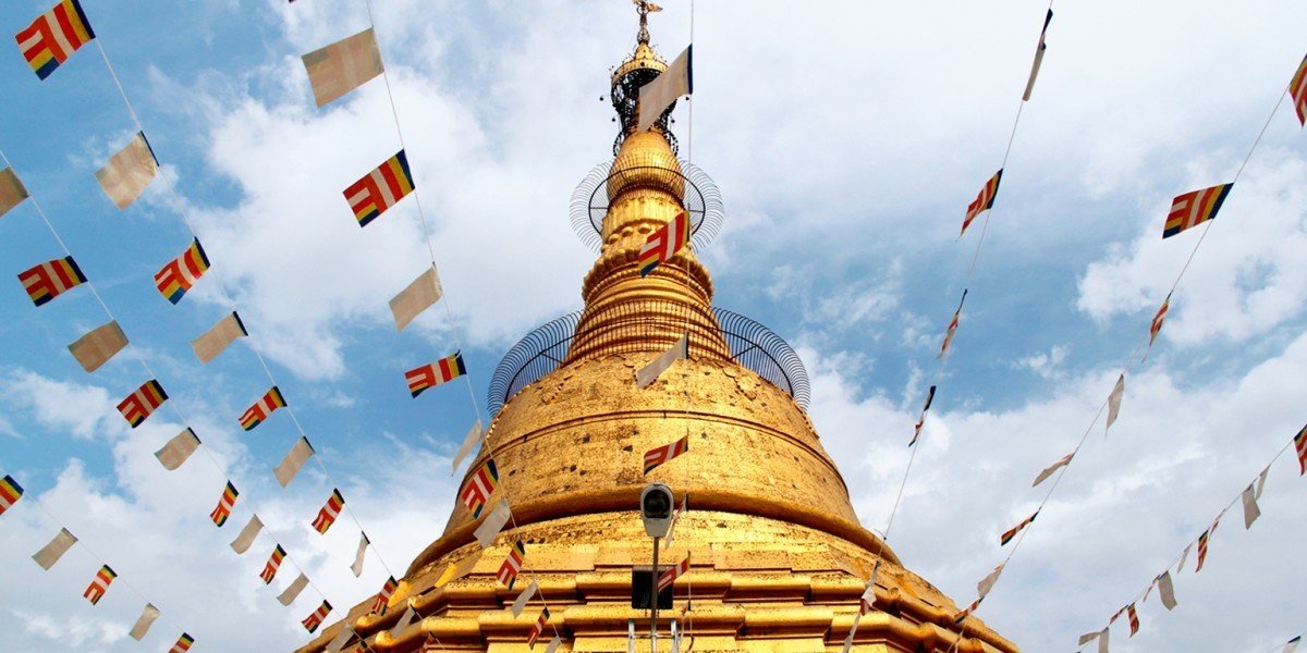 Trip Ideas sky outdoor landmark tower stupa pagoda wat temple place of worship spire colored