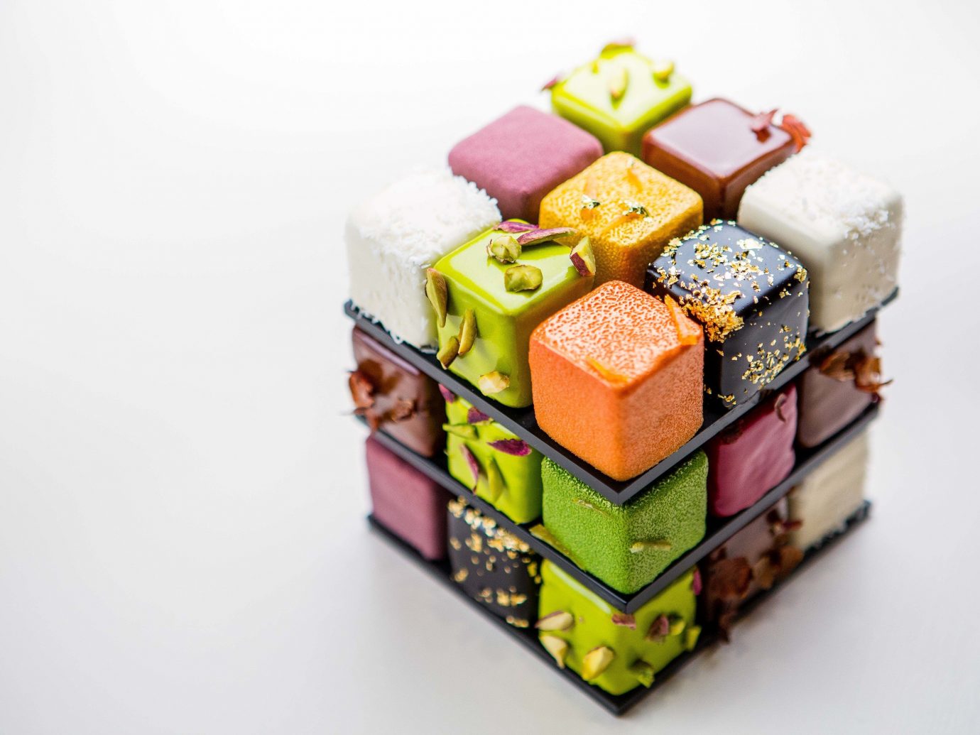 europe Trip Ideas cake indoor toy sweetness product petit four confectionery product design food decorated square colored