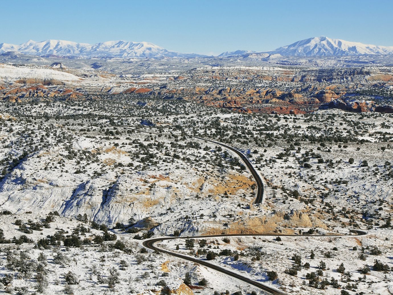 Road Trips Trip Ideas outdoor sky mountain aerial photography snow photography Winter geological phenomenon residential area landscape mountain range Nature geology panorama piste cityscape