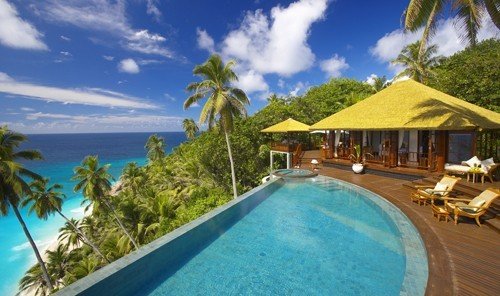 Hotels tree outdoor swimming pool property caribbean Resort leisure vacation Villa estate real estate bay eco hotel blue