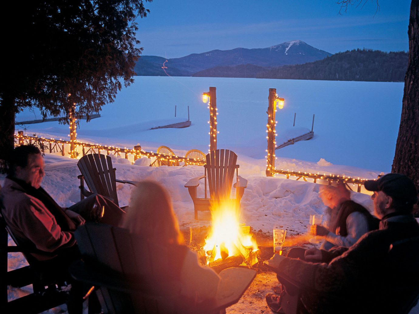 alpine skiing East Coast USA Firepit Hotels Lake Lodge Nature New York Outdoor Activities Romantic Hotels Rustic Trip Ideas Waterfront sky outdoor person light evening candle morning lit Sunset bonfire