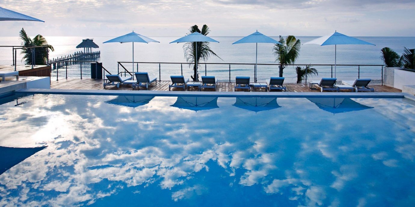 Hotels sky outdoor swimming pool blue leisure Resort vacation Nature estate Villa day clouds shore